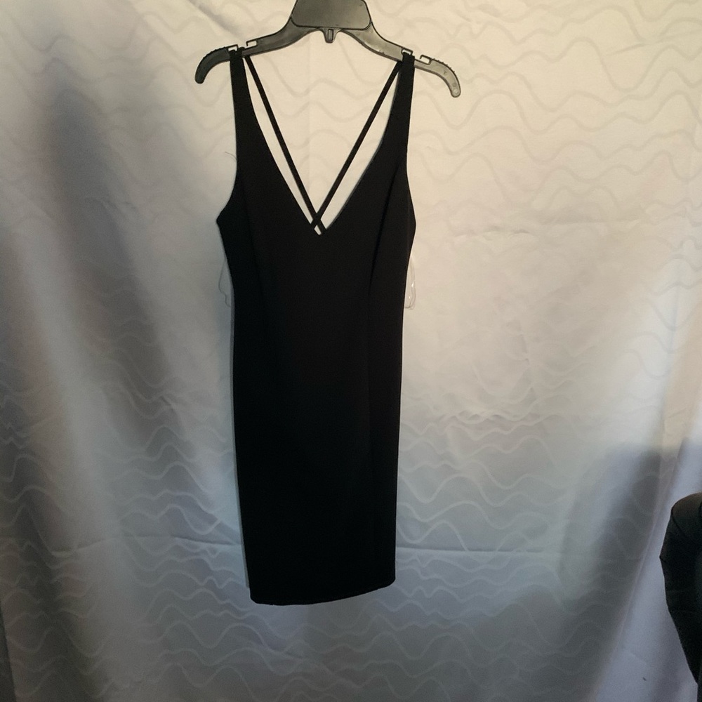 All black dress with straps on the back